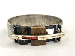 Fosil ivory, coral, hinged bracelet by Fred Tate