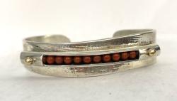 Coral, 14K silver cuff bracelet by Fred Tate